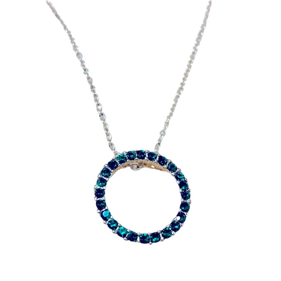 Avon Jewelry - Avon Emerald colored stone eternity necklace